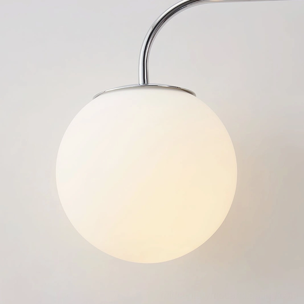 Contemporary wall-mounted task light with telescoping reach for workspace