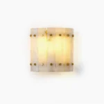 Belmont Alabaster Wall Sconce front studio view with translucent segmented panels and brass studs