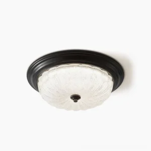 Belmont matte black flush mount ceiling lamp with ribbed frosted glass shade, overhead studio view
