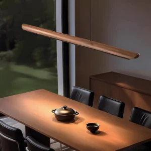 Belto linear pendant light installed above modern dining room table warm ambient lighting mid-century style