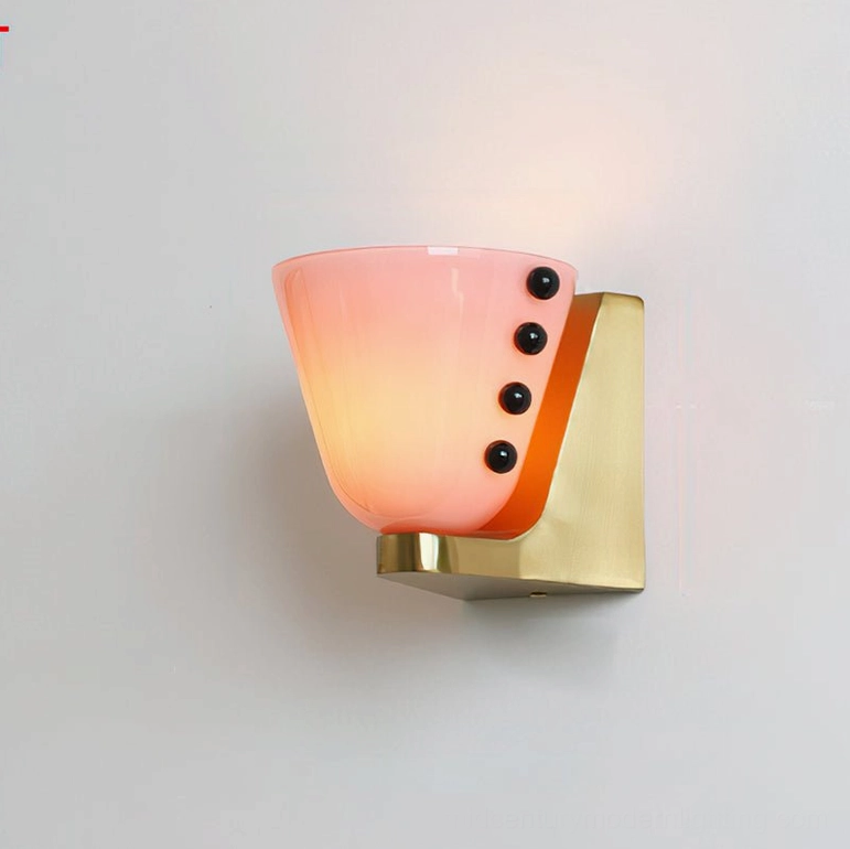 Berries wall lamp in soft pink and gold finish showcasing hand-crafted glass and bead accent details