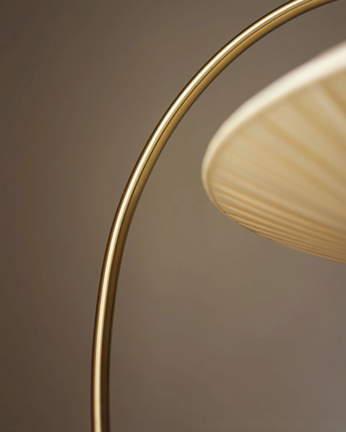 Bertil lampshade and arched frame detail, pleated beige fabric shade with polished brass gold metal arc support