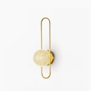 Bervalo brass crystal wall sconce with rounded frame in modern minimalist design, frontal view on white background