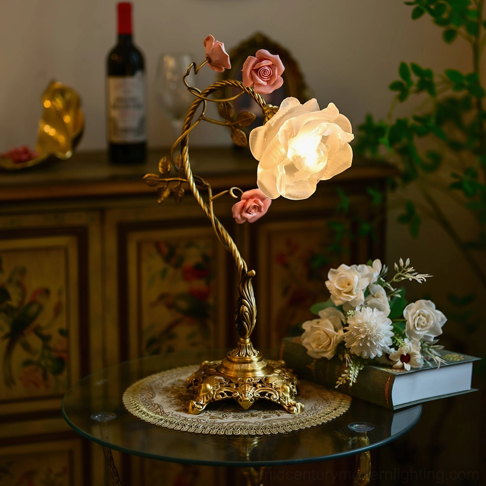 Lit Beulah rose table lamp in vintage home interior with wine bottle and floral decorative styling