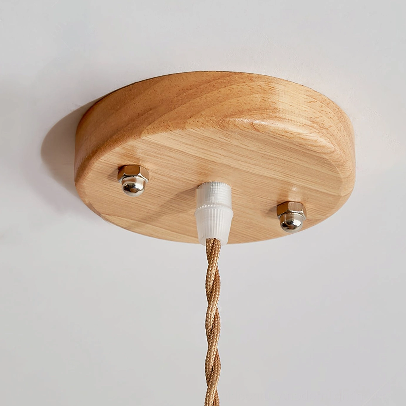 Bianella pendant lamp mounted in contemporary interior showing natural wood hardware and pleated fabric shade integration