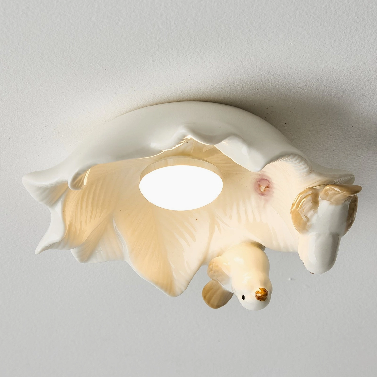 Bilal Bird ceramic ceiling light displaying complete fixture with dual birds on flower-shaped mounting base