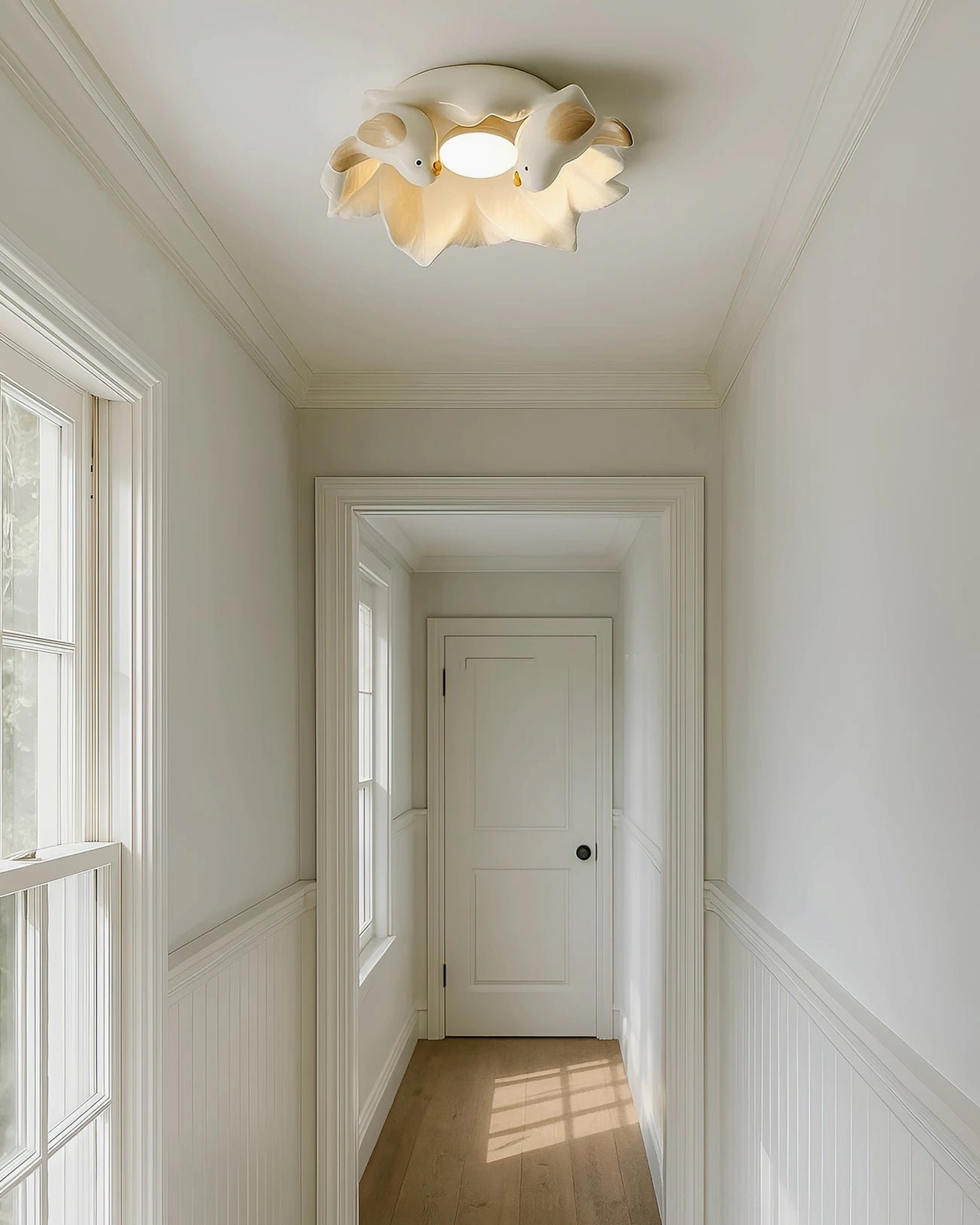 Bilal Bird ceramic ceiling light installed in minimalist farmhouse hallway creating soft ambient illumination