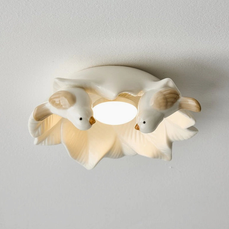 Bilal Bird ceramic ceiling light full fixture display in off-white showing bird details and overall proportions