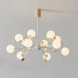 Lit Birdle Chandelier with warm ambient glow from milky glass shades and natural wood accents illuminated