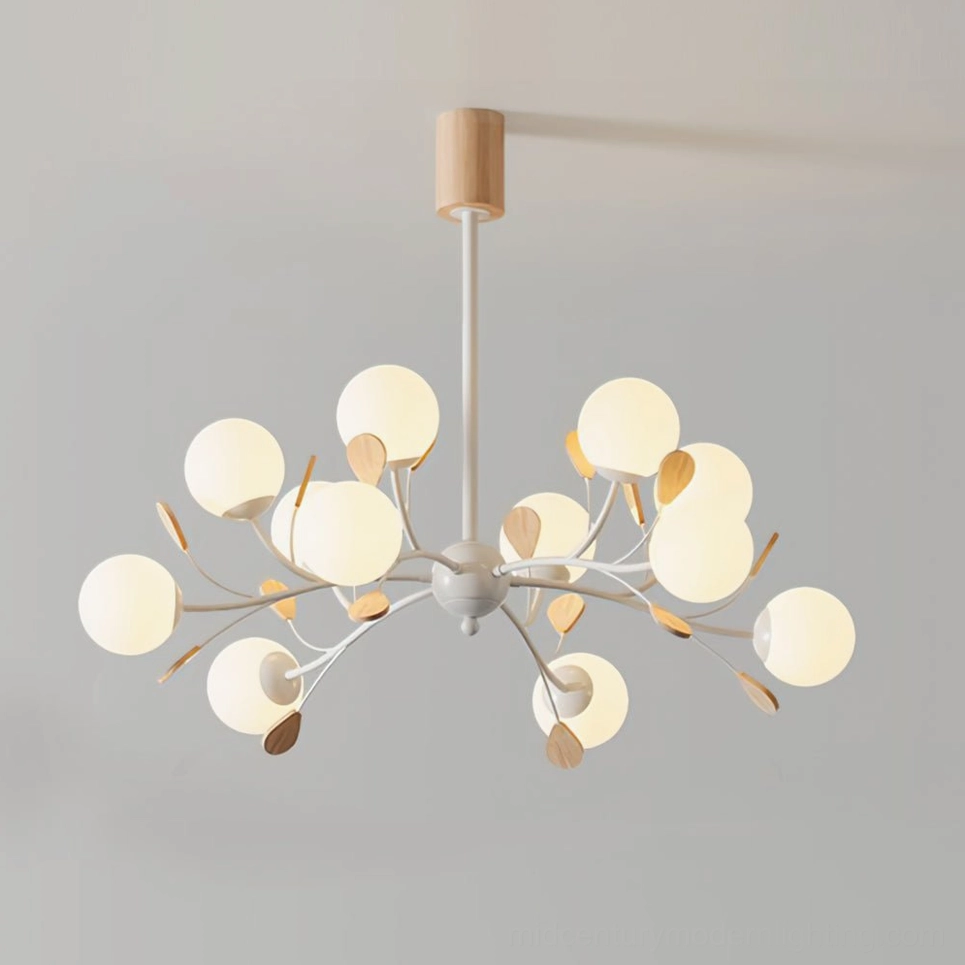 Lit Birdle Chandelier with warm ambient glow from milky glass shades and natural wood accents illuminated