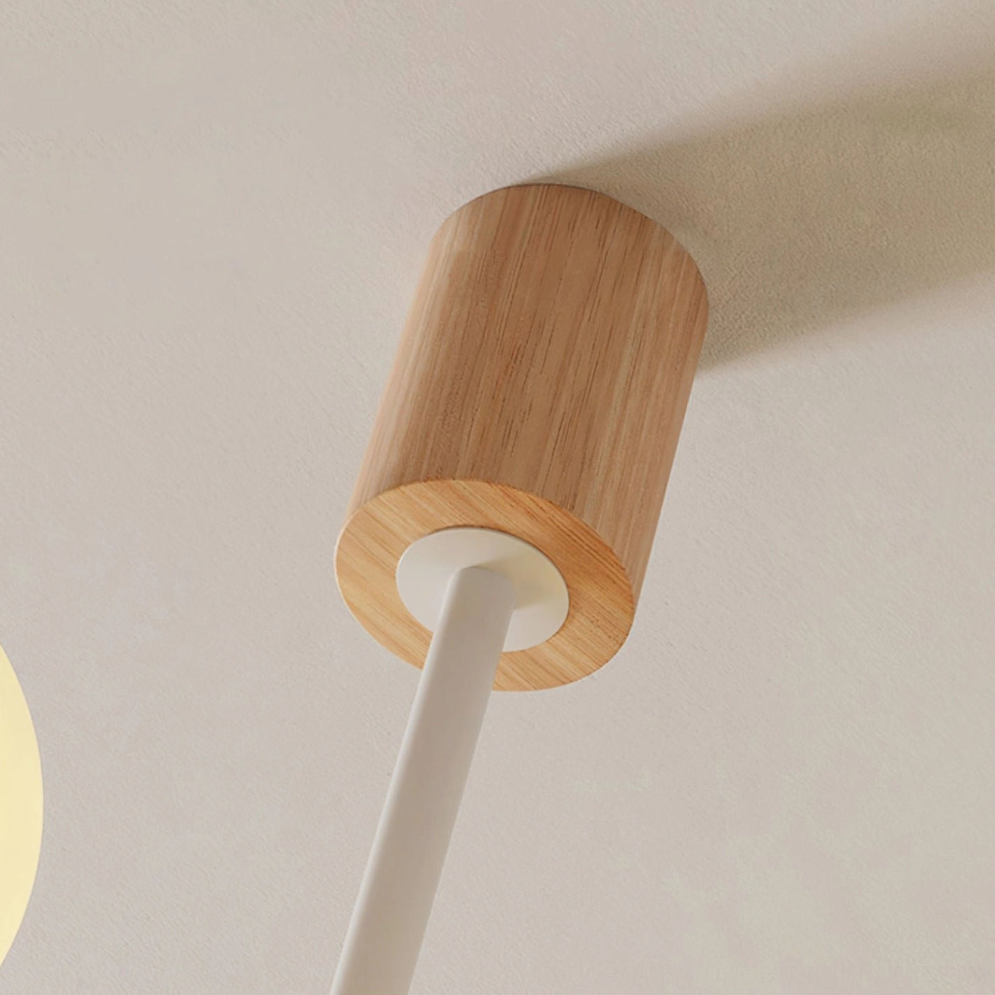 Birdle Chandelier ceiling mount detail showing solid wood top base and white metal suspension rod
