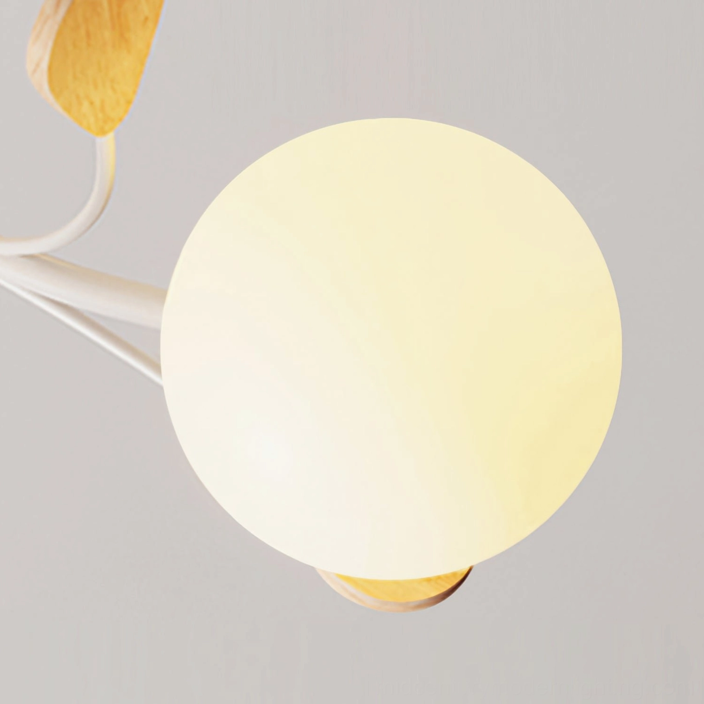 Close-up of Birdle frosted glass shade showing diffused warm light and quality craftsmanship