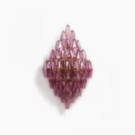 Biscayne polyhedral glass wall sconce with pink and gold finish, front view showcasing geometric faceted glass design