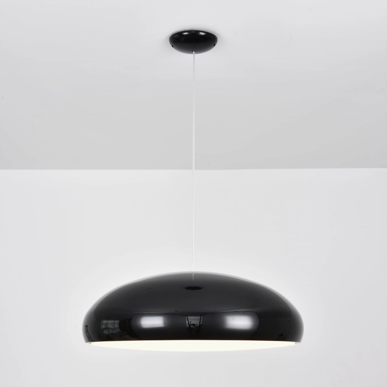 Black glossy dome pendant light front hanging shot mid-century modern fixture