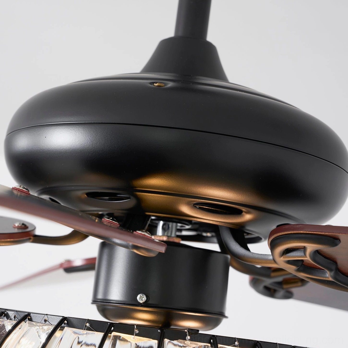 Black finish ceiling fan light with crystal enclosure, architectural detail showing geometric frame design and crystal work