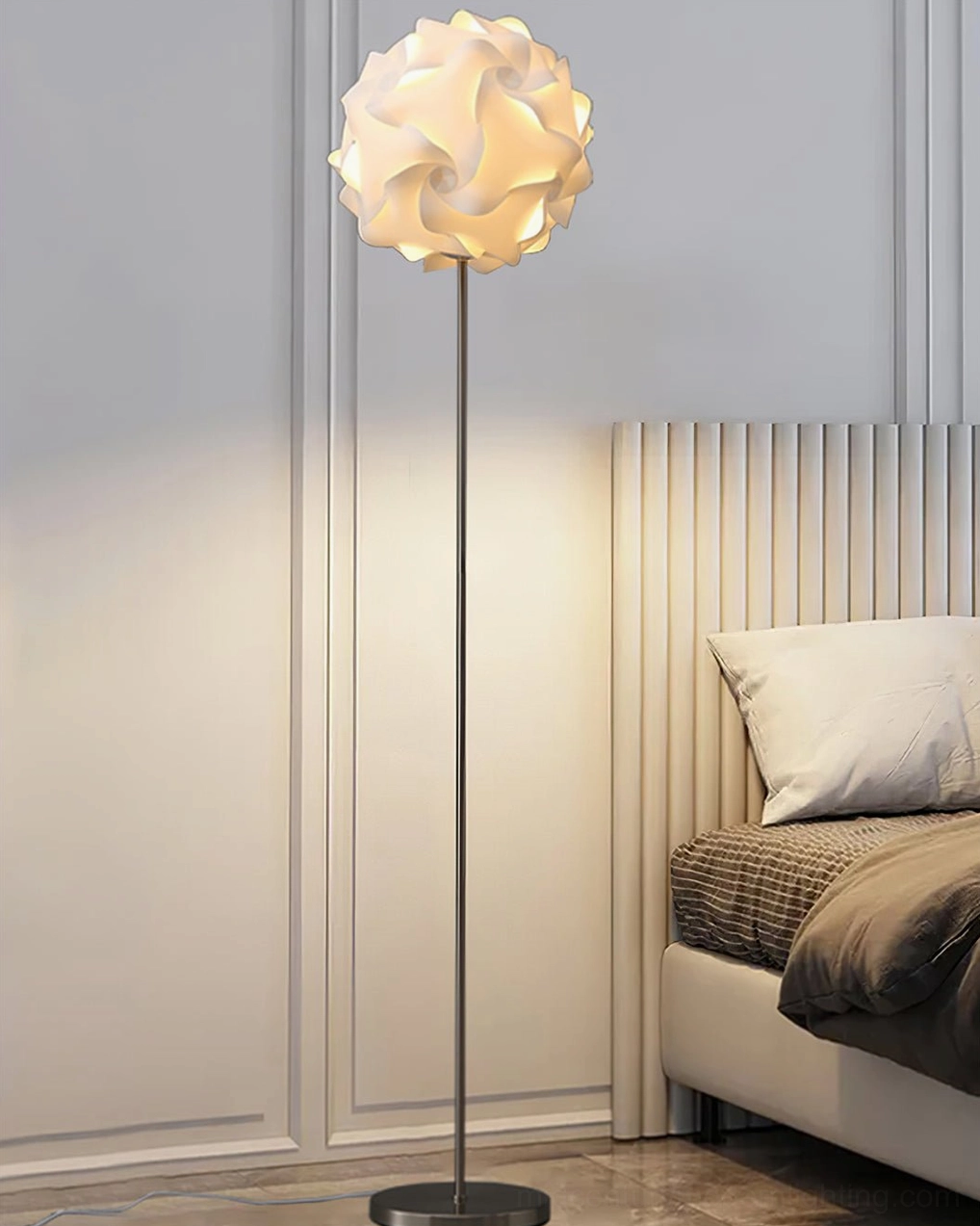 Minimalist flower floor lamp with black metal pole in modern bedroom interior design