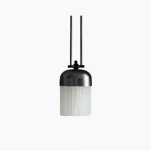 Minimalist black pendant light with frosted ribbed glass shade, front studio view showing matte metal top and diffused glow