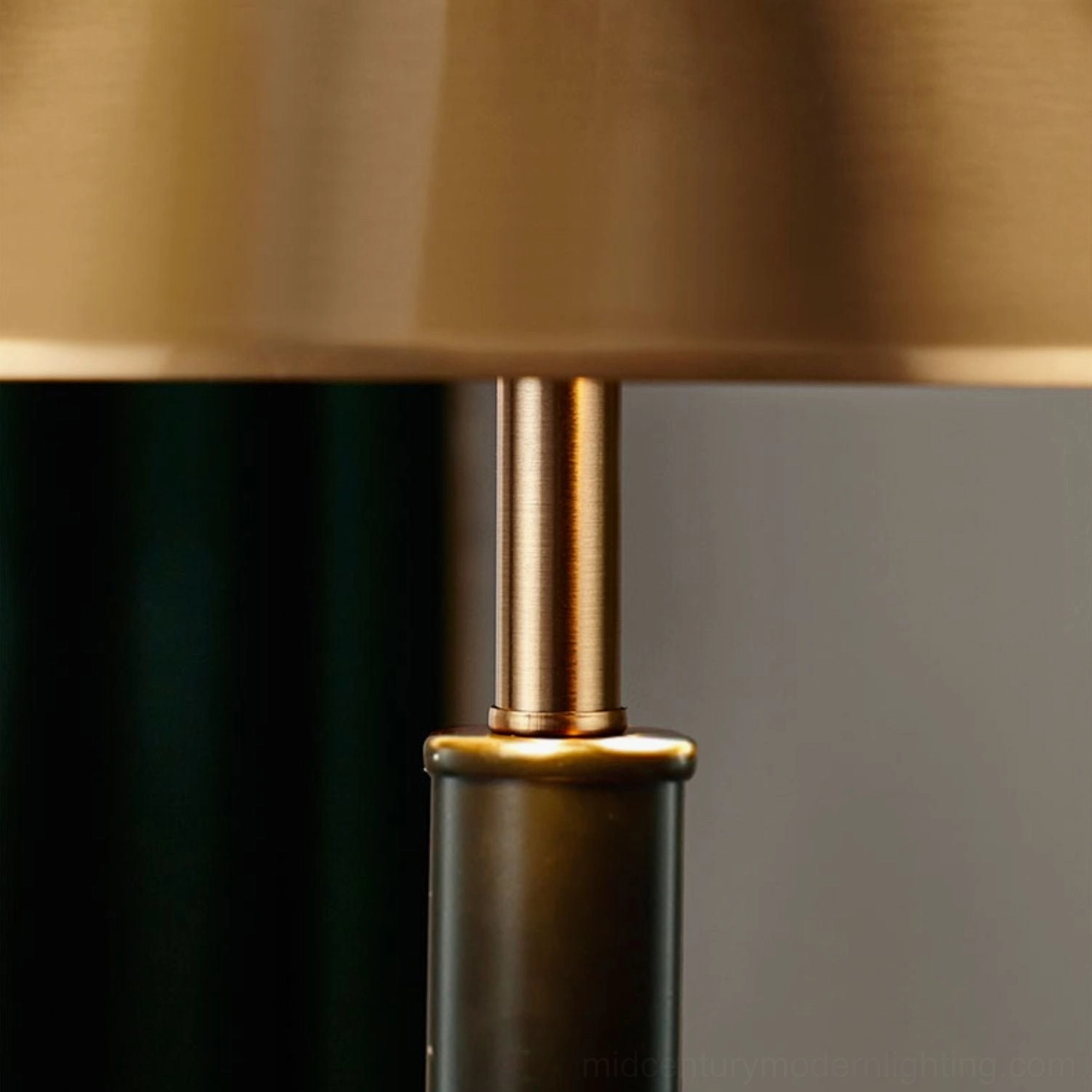 Contemporary futurist table lamp three-quarter angle view, black matte gold brushed