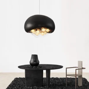 Black Khmara Bubbles modern pendant lamp hanging from ceiling, overhead view showing warm LED bubble cluster illumination