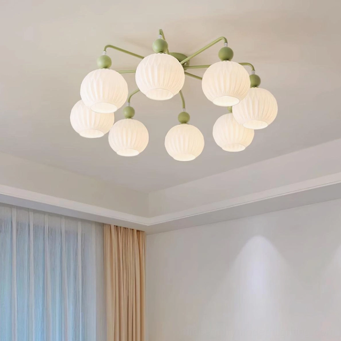 Matte black ceiling light with white glass shades, mid-century modern design detail