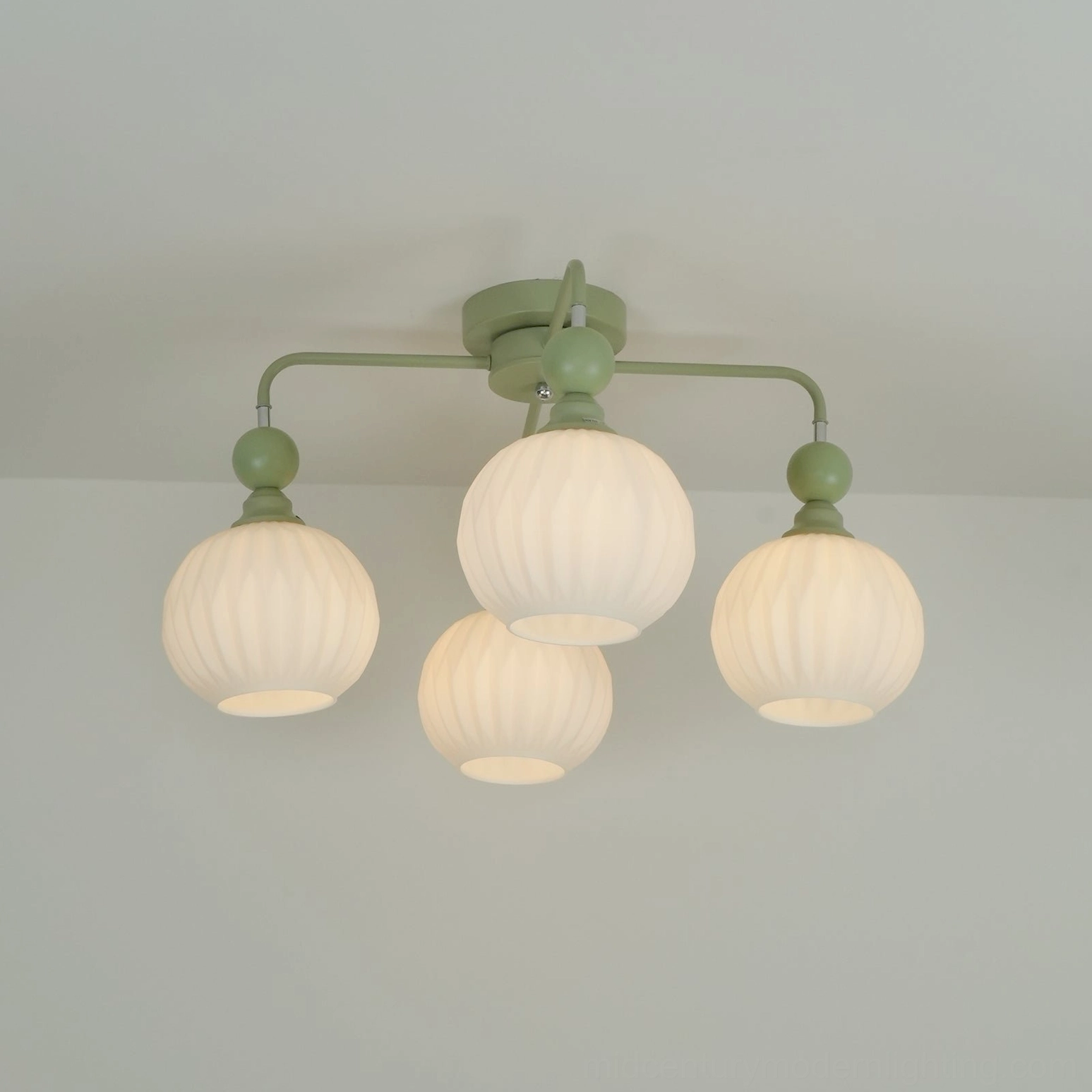 Matte black mid-century modern ceiling light, sculptural metal and glass fixture