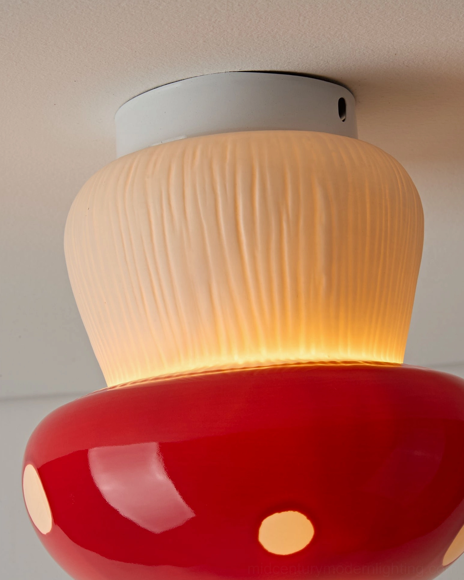 Black mushroom ceiling light with mid-century modern interior design styling