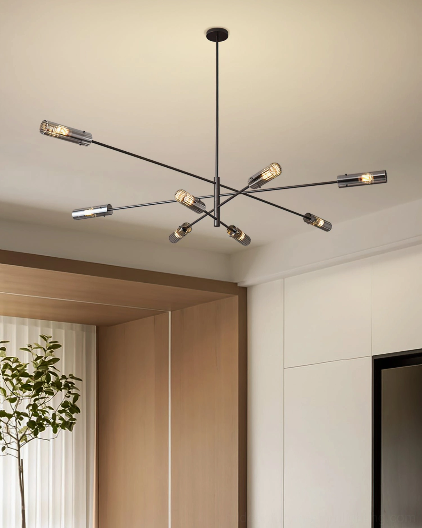 Matte black sputnik chandelier in modern living space neutral tones minimalist interior