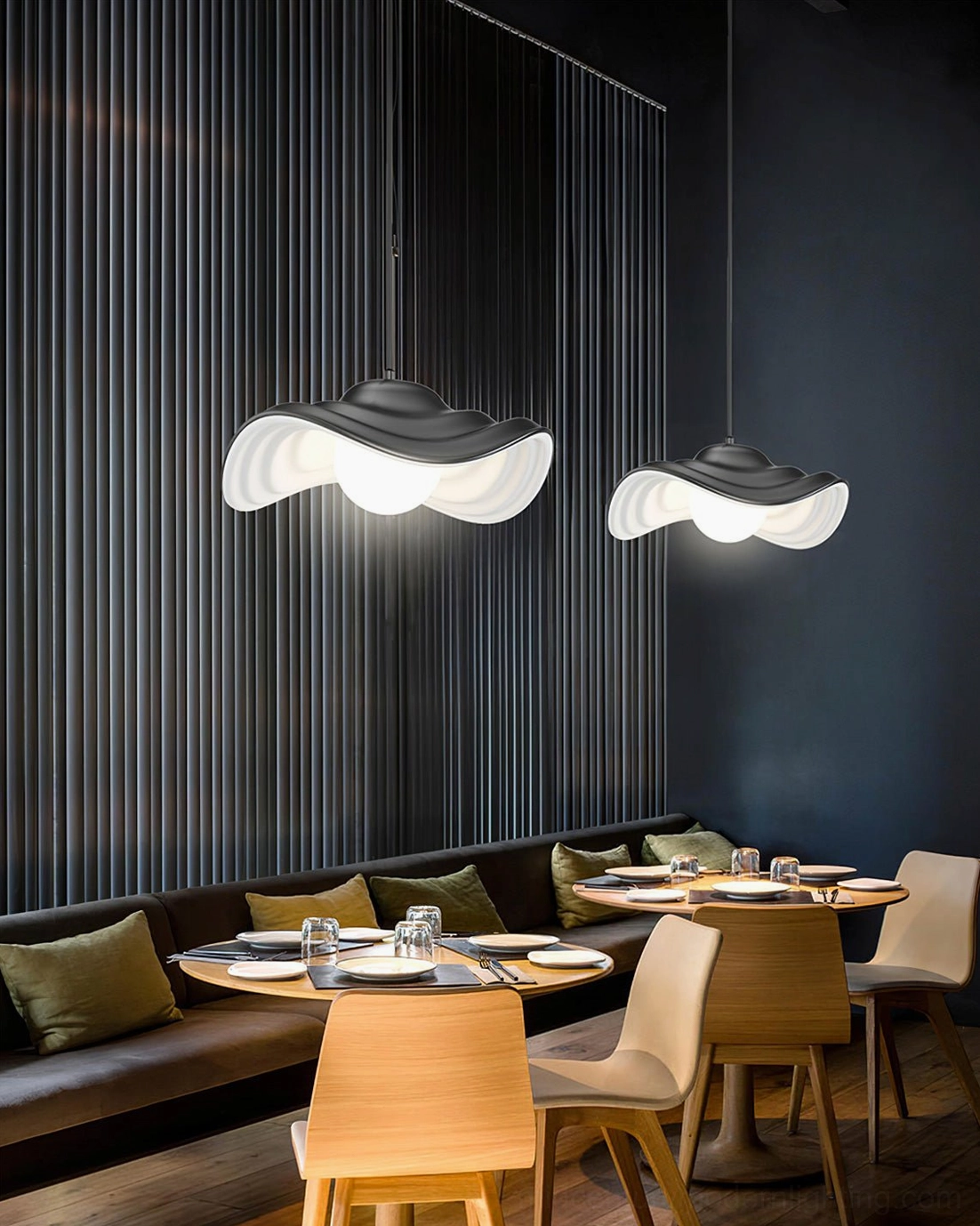 Matte black wavy pendant light installation detail showing ceiling mount system and elegant suspension cord for modern home lighting