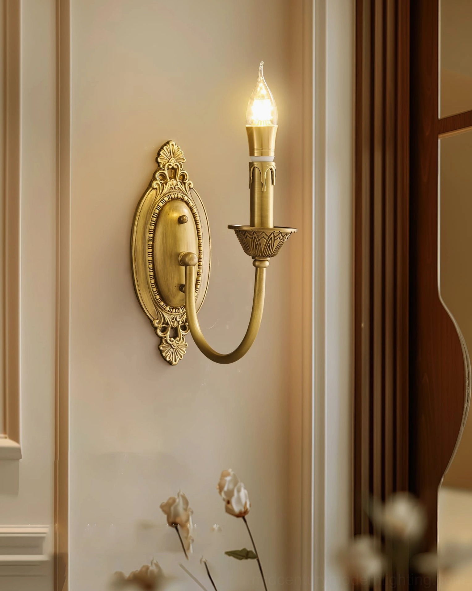 Blair brass candle wall sconce showing vintage-inspired design with hand-finished brass material
