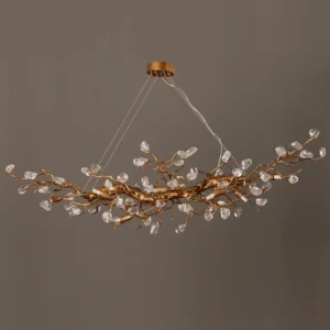 Close-up detail of Bloom Branch Chandelier brass twig structure with sparkling crystal decorative elements
