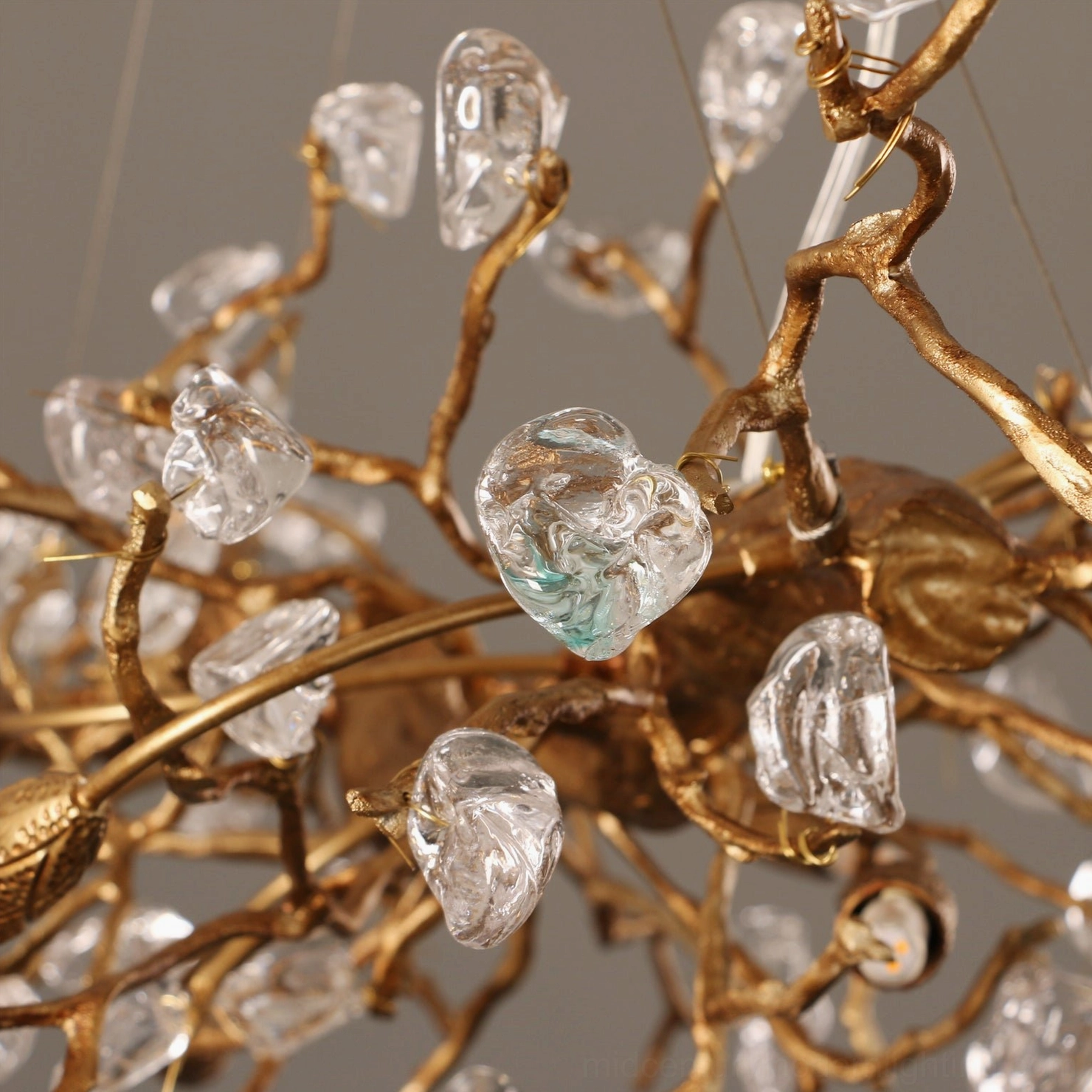 Bloom Branch Chandelier crystal glass elements catching light showing refraction and sparkle details