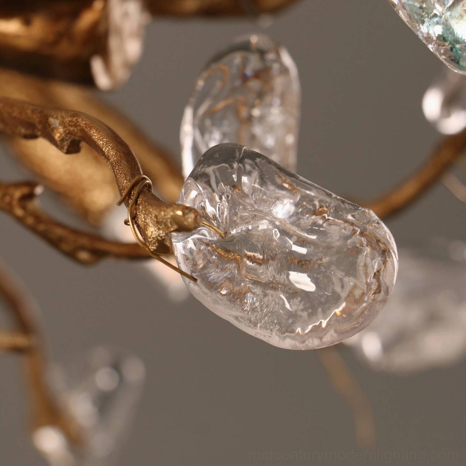 Bloom Branch Chandelier full product view in studio showing antique bronze brass construction and glass accents