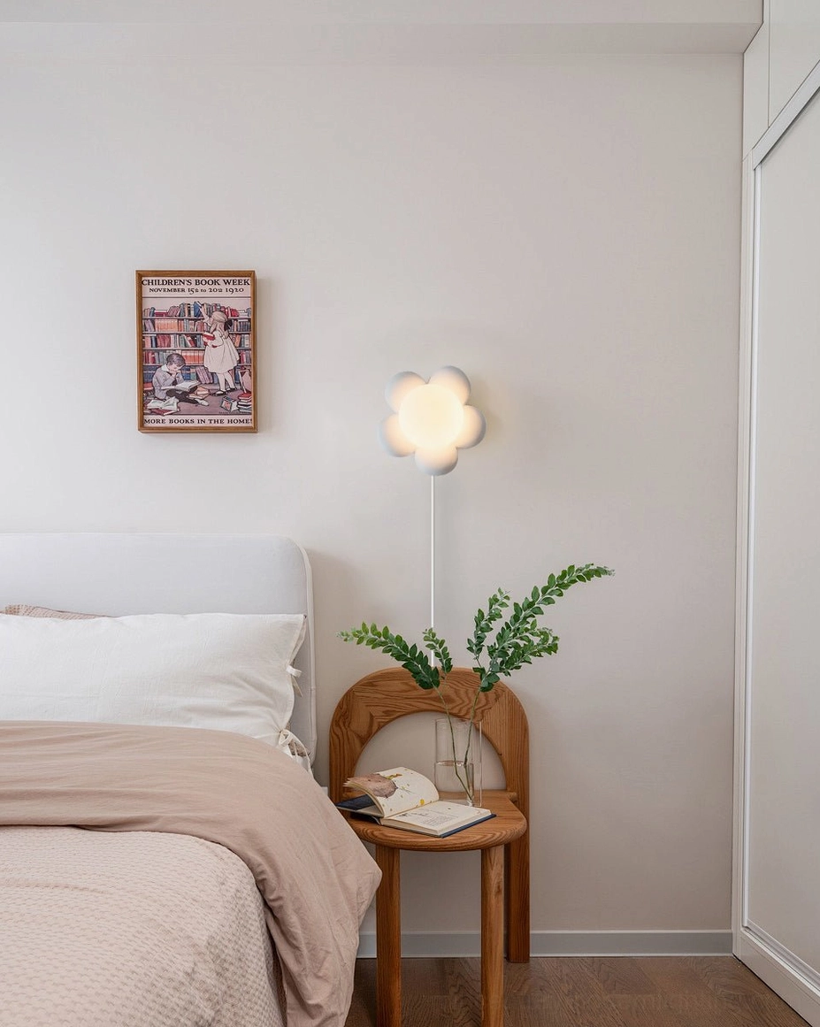 Bloom white flower wall lamp bedroom installation Nordic minimalist decor with bed and nightstand