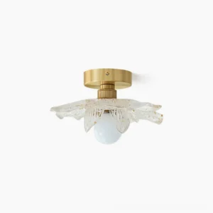 Blossom petal ceiling lamp with clear ribbed glass shade and brass gold mounting base, overhead studio view