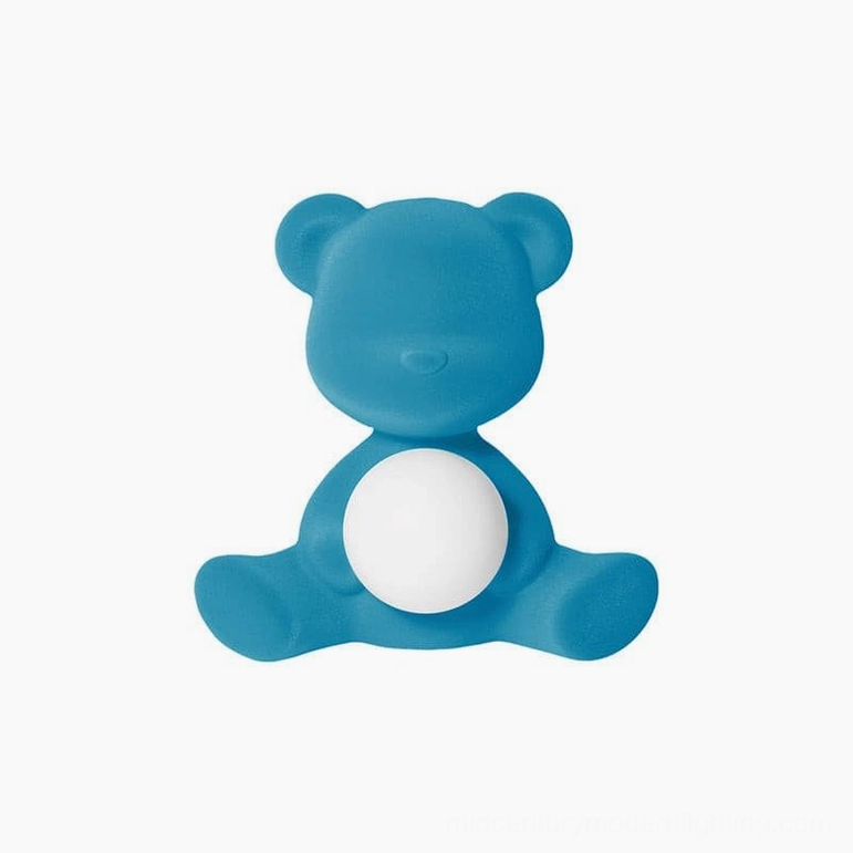 Blue teddy bear table lamp showing deep color saturation on flocked surface