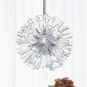 Blum Chandelier with 19 heads installed in modern living room with white sheer curtains and hanging chain