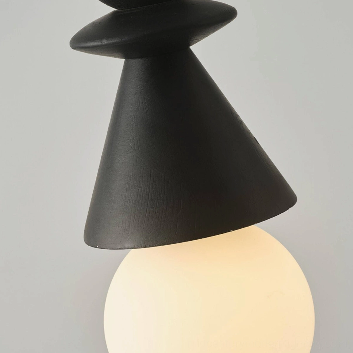 Modern Bodie stacked wood totem pendant light in natural finish with white accents ready for installation, flat lay composition