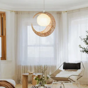 Bohemian moon pendant light hanging in Japanese minimalist living room with sheer curtains and beige hemp rope weave