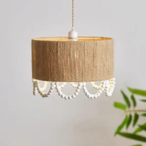 Close-up detail of jute woven pendant lamp showing twine texture and scalloped wooden bead trim