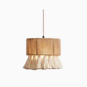 Boho Rara tassel pendant lamp with handwoven jute shade and fluffy cotton tassels, studio front view