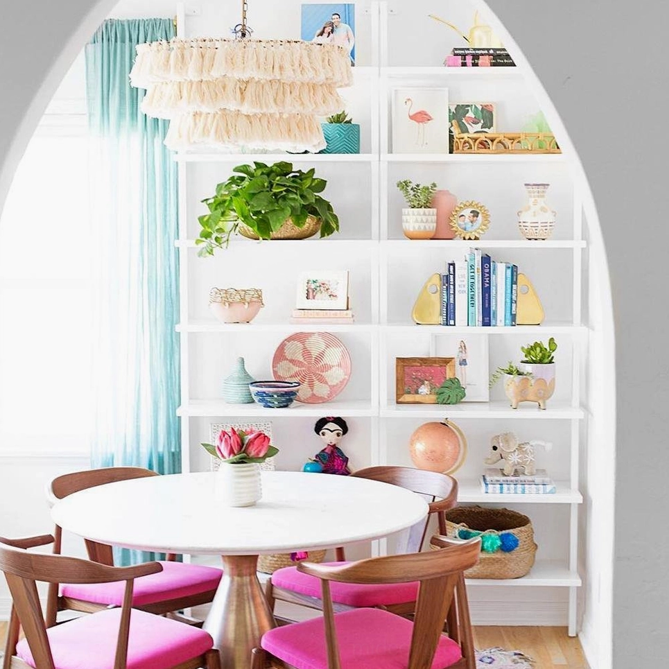 Bohemian tassel chandelier suspended in mid-century modern space with contemporary furnishings