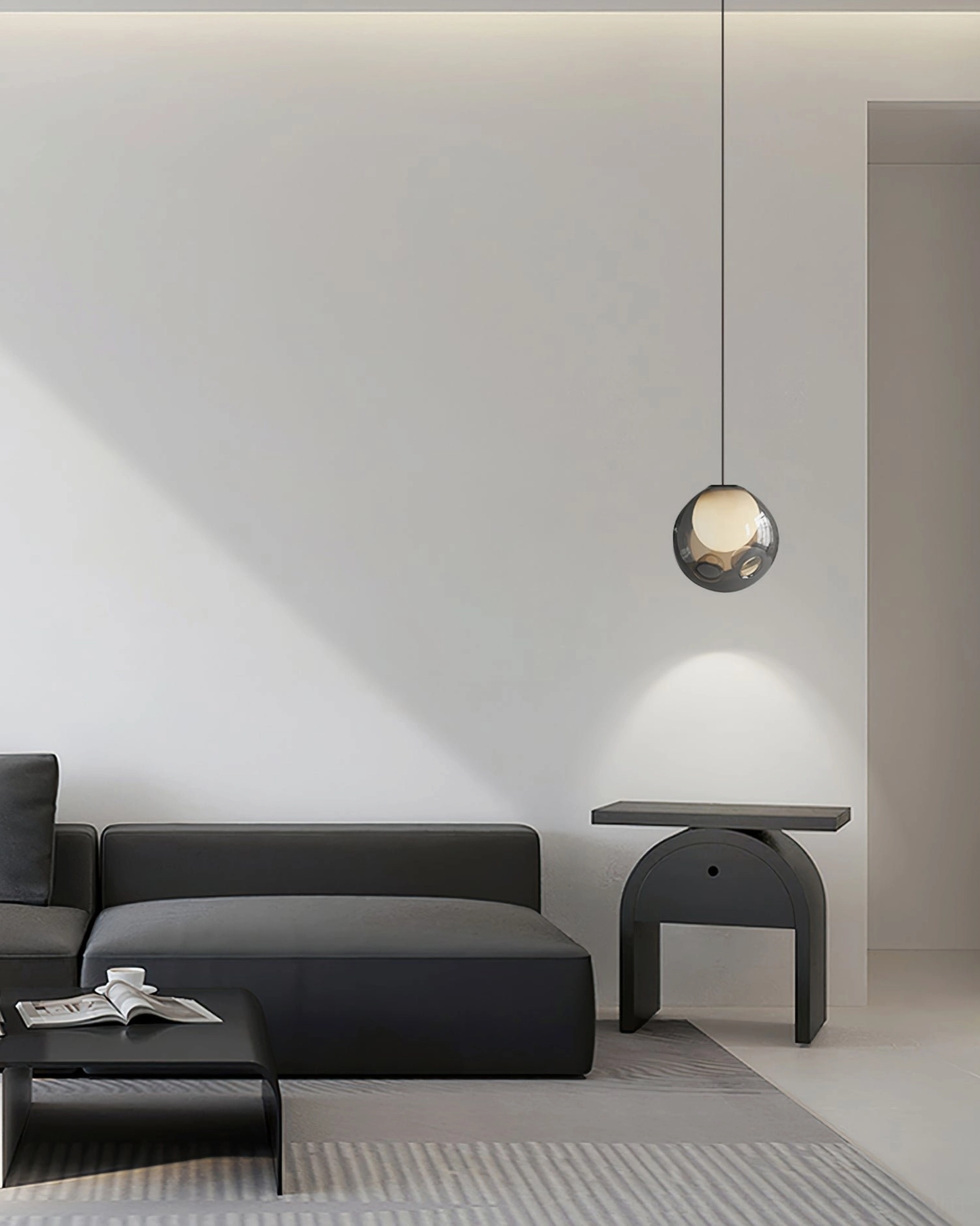Bokt smoked glass pendant minimalist living room wall wash ambient light effect
