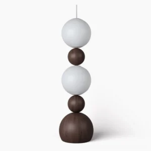Bola stacked sphere floor lamp with frosted glass diffusers and dark brown wood frame on white background