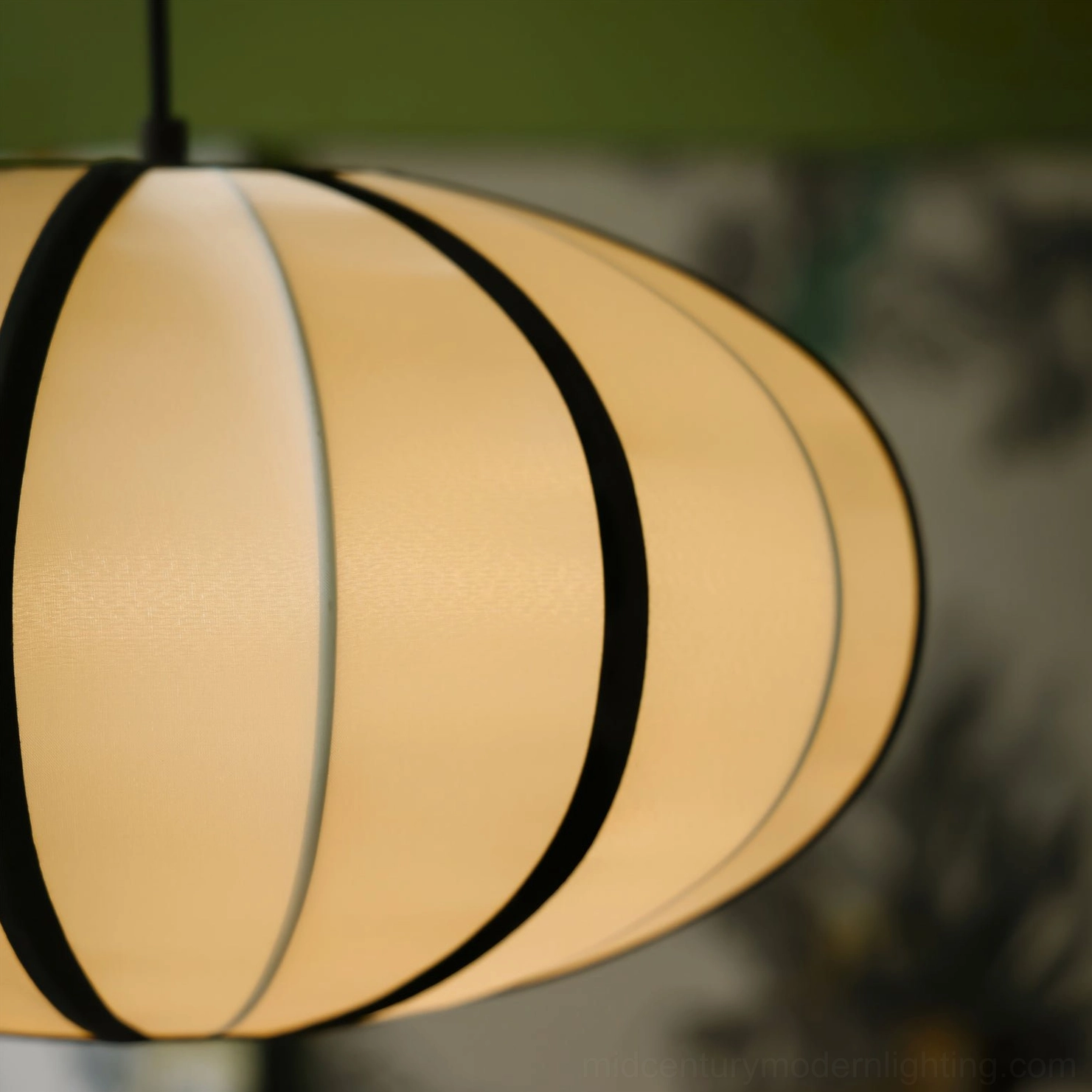 Bombori pendant light above dining setting, soft ambient lighting effect