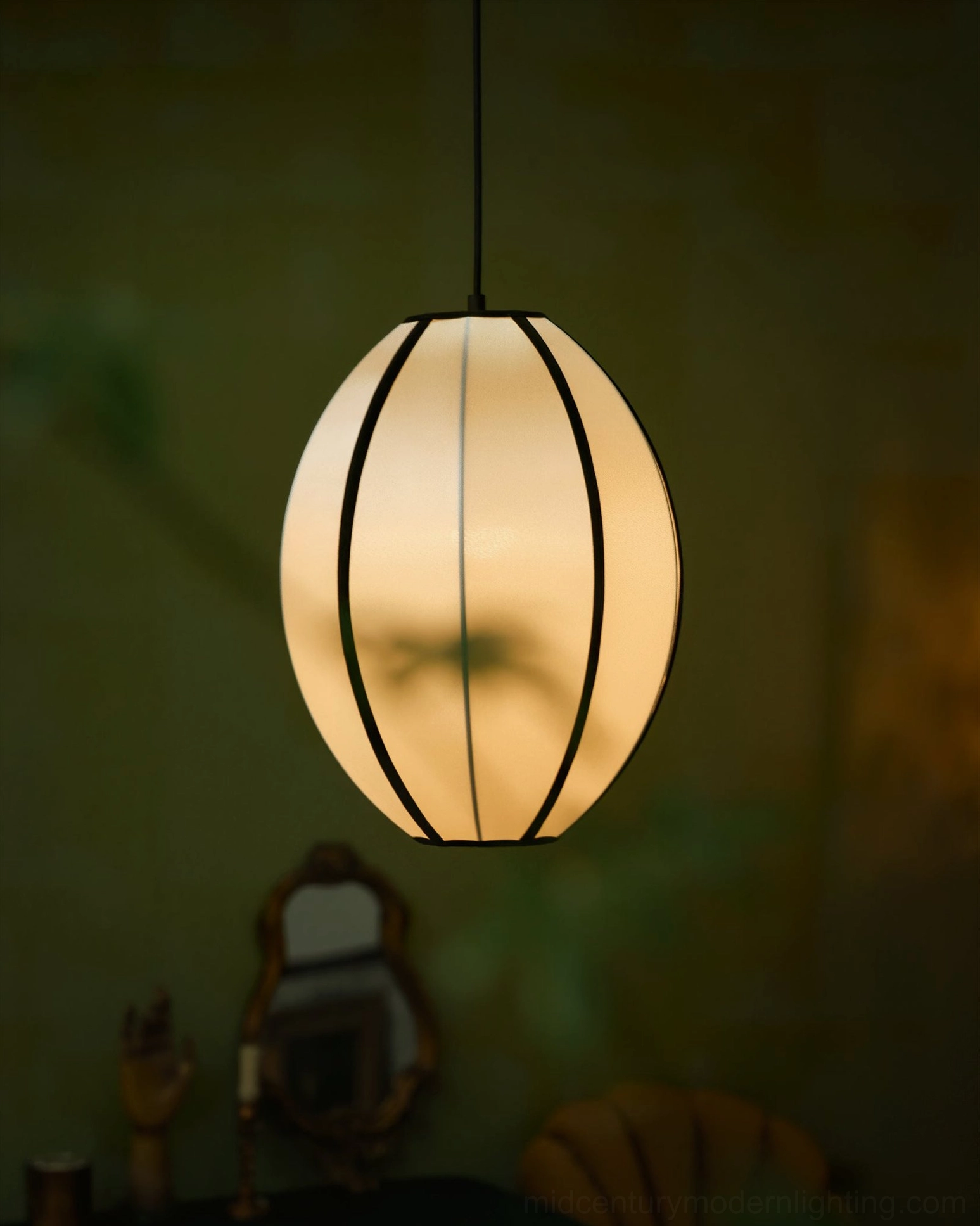 Bombori fabric pendant light showing black trim and geometric framing