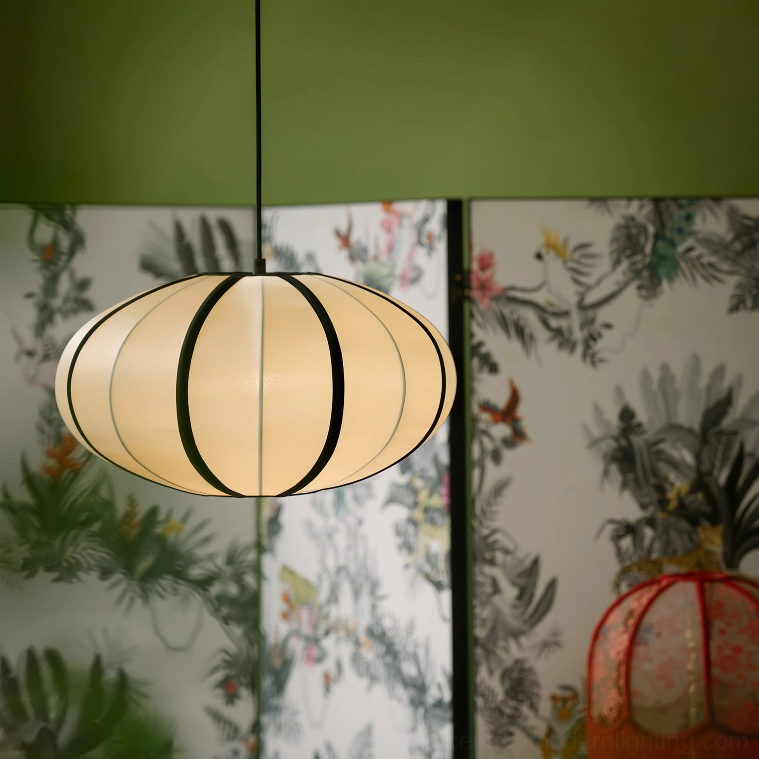 Single Bombori fabric pendant light with vintage floral screen backdrop, warm glow