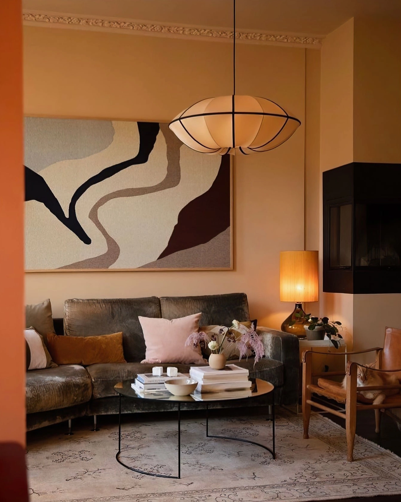 Bombori pendant light showing warm diffused light through off-white fabric
