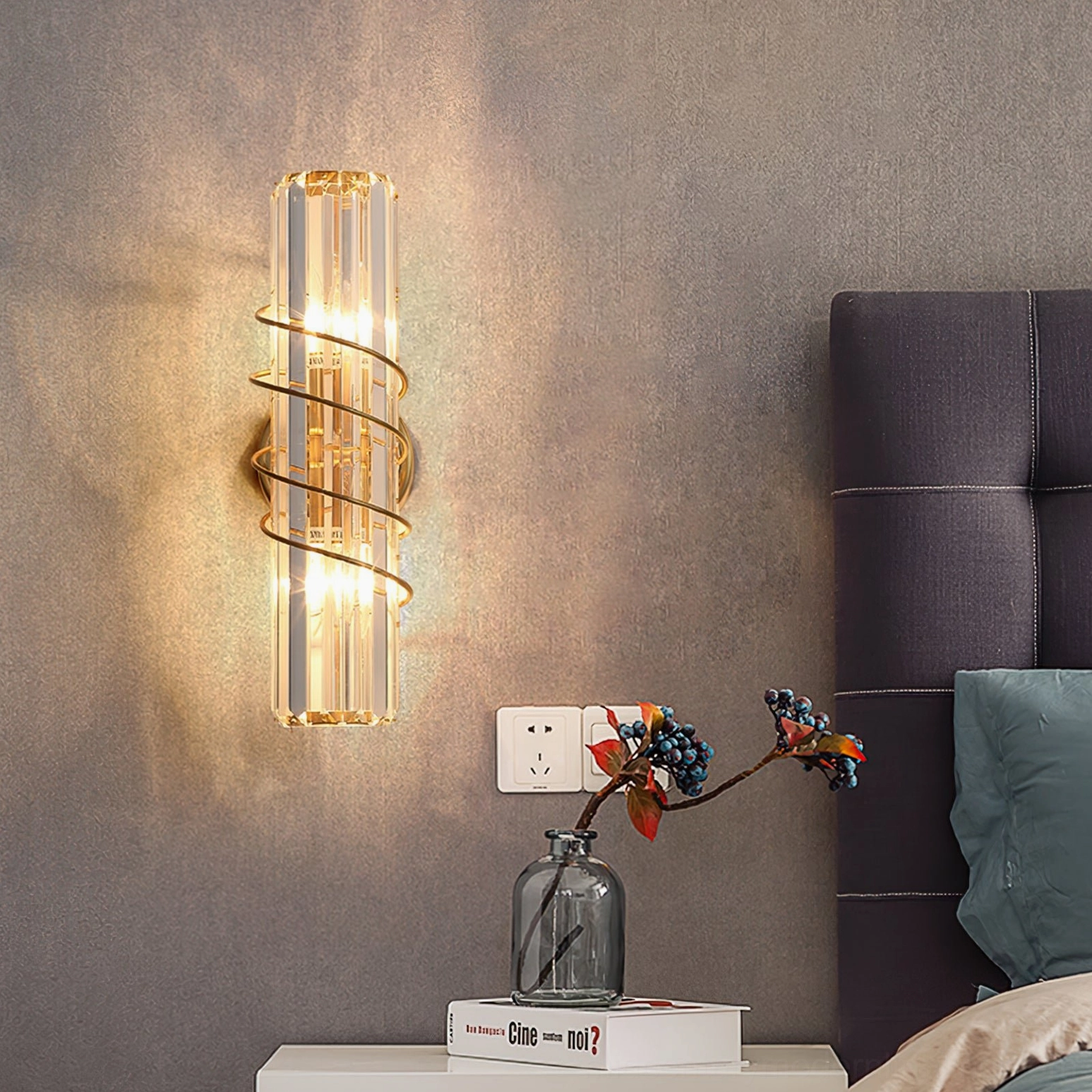 Bonnington wall sconce in bedroom with warm lighting and floral decor styling