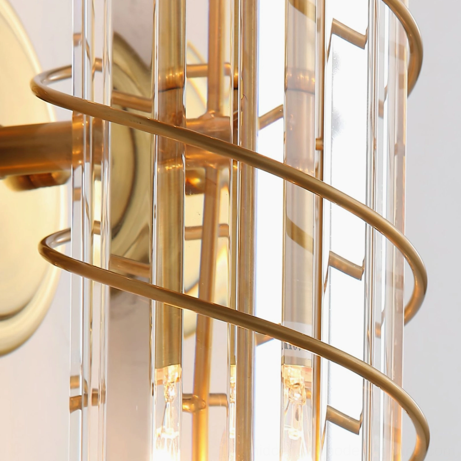 Bonnington wall lamp internal detail showing brass metal parts and clear crystal rod construction