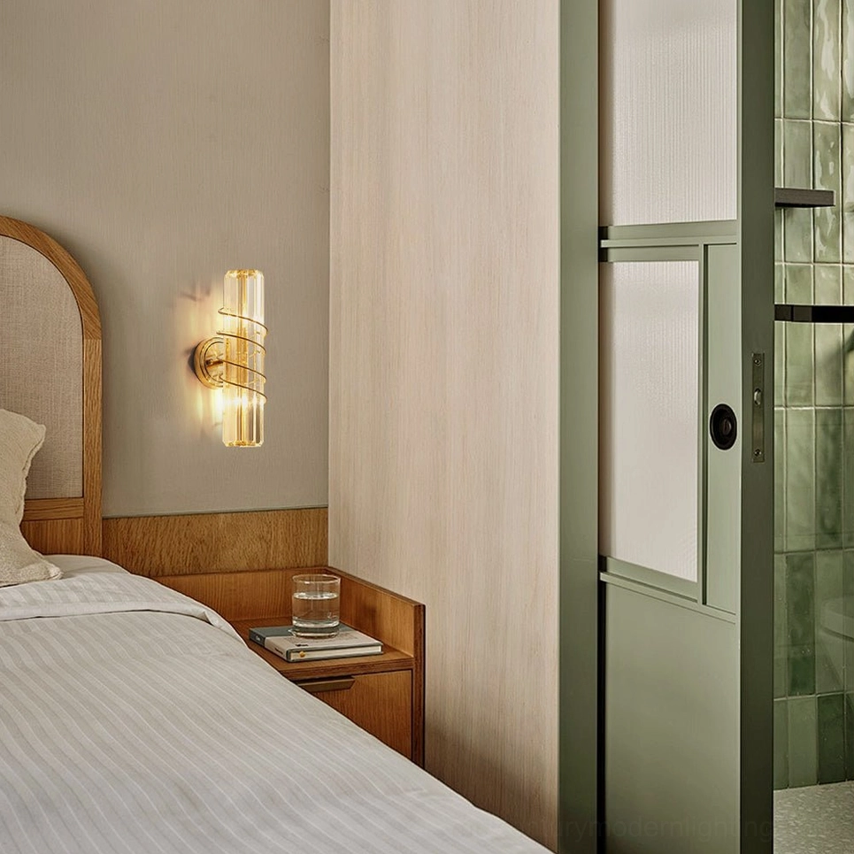 Bonnington brass gold wall lamp mounted in hotel-style bedroom scene
